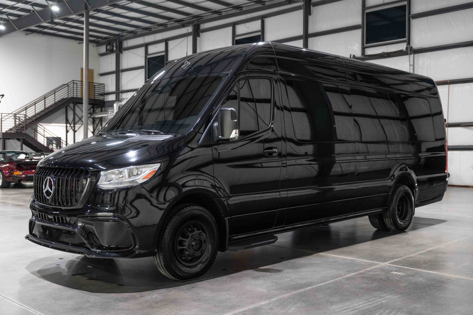 A black 2021 Mercedes-Benz Sprinter 3500 high-roof dually, front three-quarter view